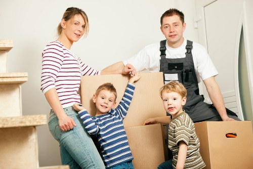 Local movers handling boxes in Harringay