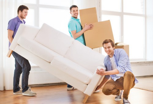 Preparing furniture for removal in a Harringay flat