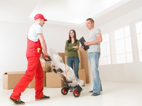 Unpacking boxes and organising a new home after moving in Harringay
