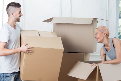 Careful loading of household items during a local move in Harringay