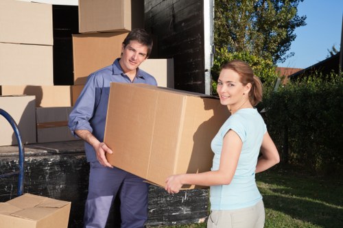 Furniture collection team preparing to load household items from a Harringay property