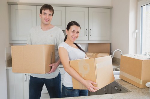 Moving van and staff handling a small business move near Harringay