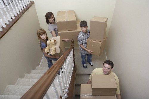 Local piano moving team navigating tight access and stairs in Harringay
